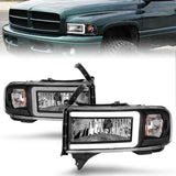 ANZO 111554 FITS 111554 - FITS: 94-02 Dodge RAM Crystal Headlightw/ Light Bar Black Housing