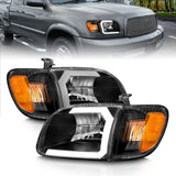 ANZO 111579 FITS 111579 - FITS: 00-04 Toyota Tundra (Fits Reg/Acc Cab Only) Crystal Headlights w/Light Bar Black w/Corner Light