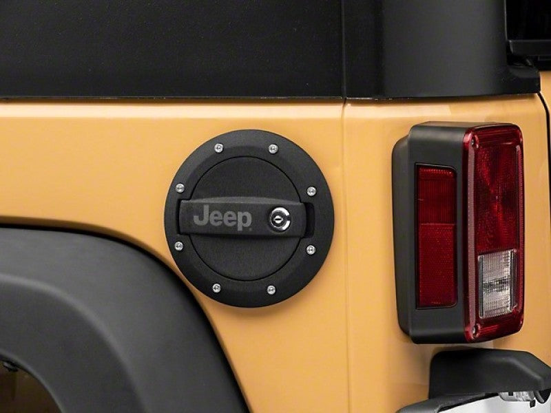 Officially Licensed Jeep oljJ157748 FITS 07-18 Jeep Wrangler JK Locking Fuel Door w/ Engraved Jeep Logo