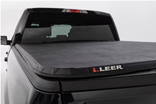Load image into Gallery viewer, LEER 1999+ Ford Super Duty LATITUDE 6Ft9In Tonneau Cover - Folding Full Size Standard Bed