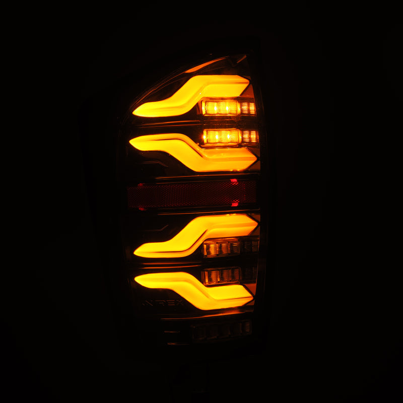 AlphaRex 680080 FITS 16-21 Toyota Tacoma LUXX LED Taillights Alpha Blk w/Activ Light/Seq Signal