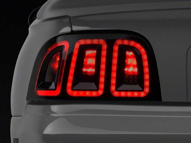 Raxiom 389876 - FITS: 96-98 Ford Mustang Icon LED Tail Lights- Black Housing (Smoked Lens)