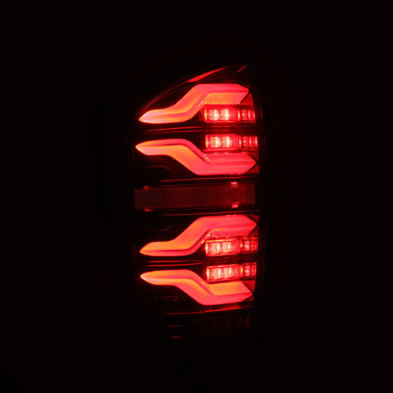 AlphaRex 680080 FITS 16-21 Toyota Tacoma LUXX LED Taillights Alpha Blk w/Activ Light/Seq Signal