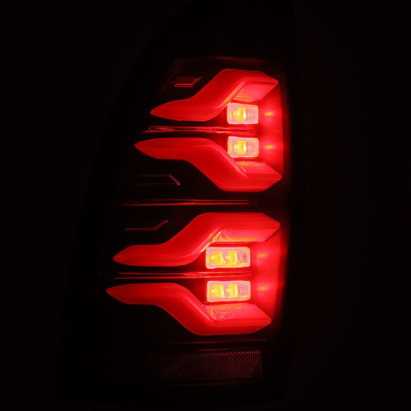 AlphaRex 680060 FITS 05-15 Toyota Tacoma LUXX LED Taillights Blk w/Activ Light/Seq Signal