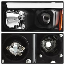 Load image into Gallery viewer, SPYDER 5084606 - Spyder 02-05 Dodge Ram 1500 Light Bar Projector HeadlightsBlack (PRO-YD-DR02V2-LB-BK)