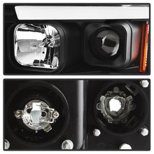 Load image into Gallery viewer, SPYDER 5084606 - Spyder 02-05 Dodge Ram 1500 Light Bar Projector HeadlightsBlack (PRO-YD-DR02V2-LB-BK)