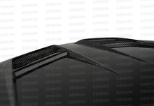 Load image into Gallery viewer, Seibon HD1011VWGTIB-DV FITS 10-11 VW Golf GTI 5K/MK6 DV Carbon Fiber Hood w/ Shaved Emblem