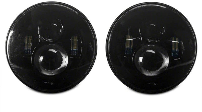 Raxiom J108042 - FITS: 97-18 Jeep Wrangler TJ/JK Axial Series LED Daymaker Headlights- Black Housing (Clear Lens)