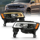 ANZO 111418 FITS: 2017-2018 Jeep Grand Cherokee Projector Headlights w/ Plank Style Switchback Black w/ Amber