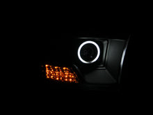 Load image into Gallery viewer, ANZO - [product_sku] - ANZO 2009-2015 Dodge Ram 1500 Projector Headlights w/ Halo Black (CCFL) - Fastmodz