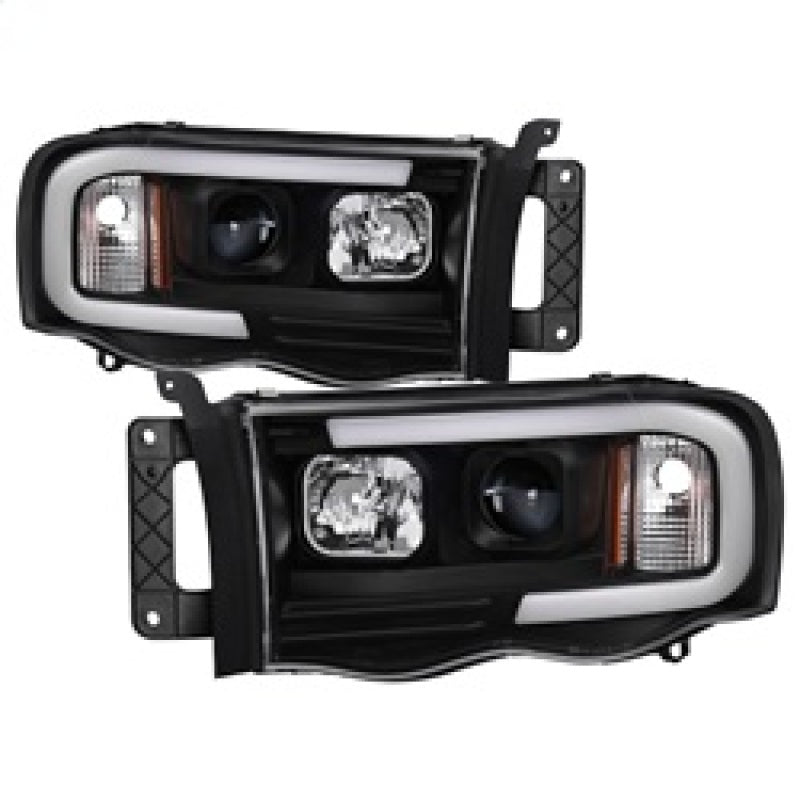 SPYDER 5084606 - Spyder 02-05 Dodge Ram 1500 Light Bar Projector HeadlightsBlack (PRO-YD-DR02V2-LB-BK)