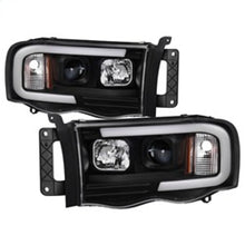 Load image into Gallery viewer, SPYDER 5084606 - Spyder 02-05 Dodge Ram 1500 Light Bar Projector HeadlightsBlack (PRO-YD-DR02V2-LB-BK)