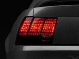 Raxiom 49080 - FITS: 99-04 Ford Mustang Excluding 99-01 Cobra Tail Lights- Black Housing (Smoked Lens)