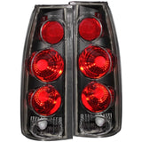 ANZO 211019 FITS: 1999-2000 Cadillac Escalade Taillights Black 3D Style