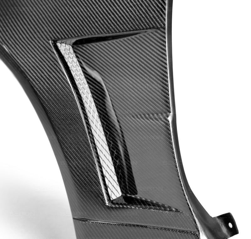 Seibon FF9901NSR34-NSW FITS 99-01 Nissan Skyline R34 NSW-Style Carbon Fiber (Gloss Finish) Fenders (Pair)