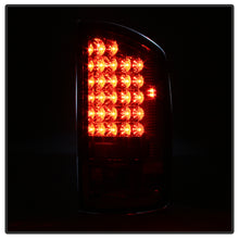 Load image into Gallery viewer, SPYDER 5002570 - Spyder Dodge Ram 02-06 1500/Ram 2500/3500 03-06 LED Tail Light Red Clear ALT-YD-DRAM02-LED-RC