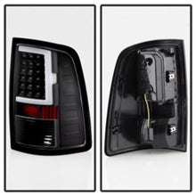 Load image into Gallery viewer, SPYDER 9041013 - xTune 13-18 Dodge Ram 1500 LED Tail LightsBlack (ALT-ON-DRAM13V2-LBLED-BK)