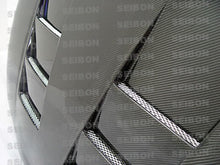 Load image into Gallery viewer, Seibon HD9398TYSUP-TS FITS 93-98 Toyota Supra (JZA80L) TS Style Carbon Fiber Hood