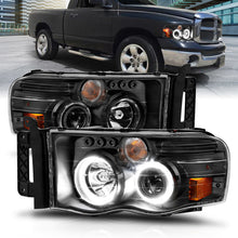 Load image into Gallery viewer, ANZO 111490 -  FITS: 2002-2005 Dodge Ram 1500 Projector Headlights w/ Halo Black Clear Amber