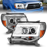 ANZO 111518 -  FITS: 2005-2011 Toyota Tacoma Projector Headlights w/ Light Bar Chrome Housing