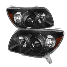 Load image into Gallery viewer, SPYDER 9023378 - Xtune Toyota 4Runner 06-09 Crystal Headlights Black HD-JH-T4R06-AM-BK