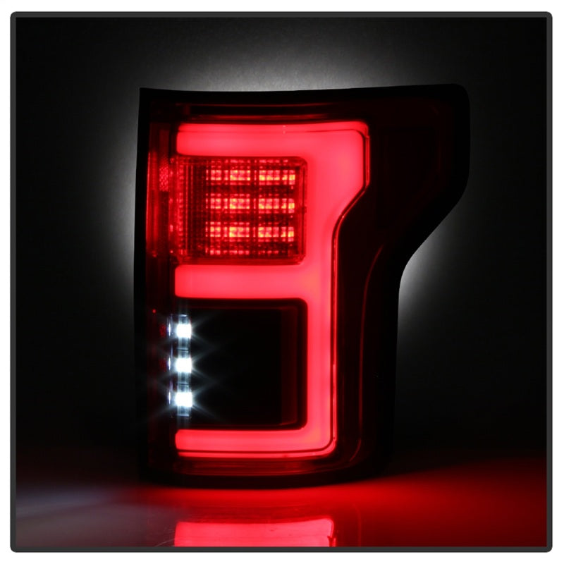 SPYDER 5085320 - Spyder 15-18 Ford F-150 LED Tail Lights (w/Blind Spot)Red Clear (ALT-YD-FF15015BS-LBLED-RC)