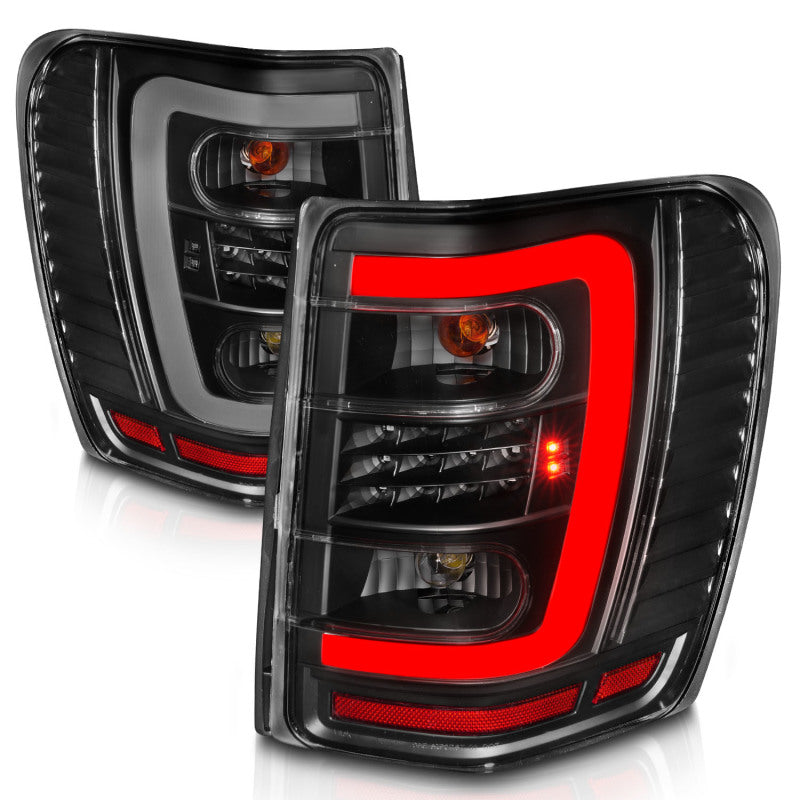 ANZO 311394 FITS 1999-2004 Jeep Grand Cherokee LED Tail Lights w/ Light Bar Black Housing Clear Lens