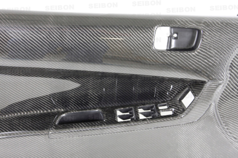 Seibon DP0809MITEVOX-F FITS 08-12 Mitsubishi Evo Carbon Fiber Front Door Panels