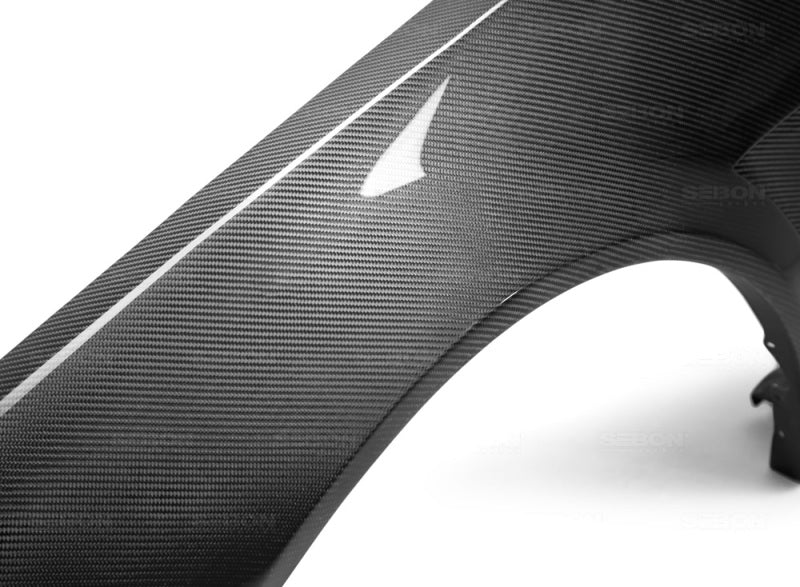 Seibon FF9901NSR34-NSW FITS 99-01 Nissan Skyline R34 NSW-Style Carbon Fiber (Gloss Finish) Fenders (Pair)